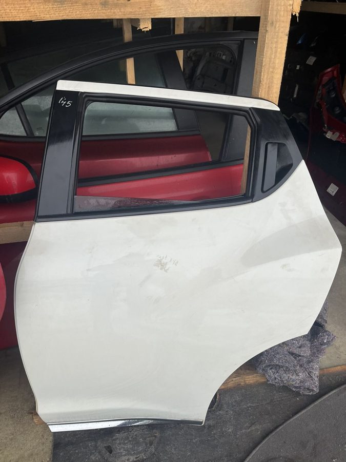 Двері задні ліві гола (білий ) TEKNA М145 NISSAN JUKE
