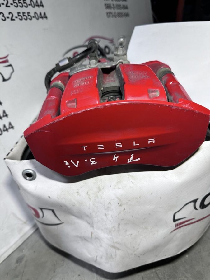 Суппорт гальмівний задній лівий з моторчиком PERFORMANCE M4 TESLA MODEL Y