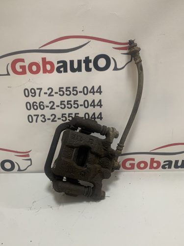 Суппорт задній лівий NISSAN QASHQAI J10