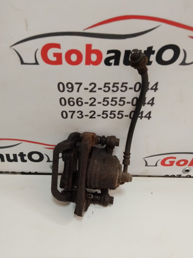 Суппорт задній правий NISSAN QASHQAI J10