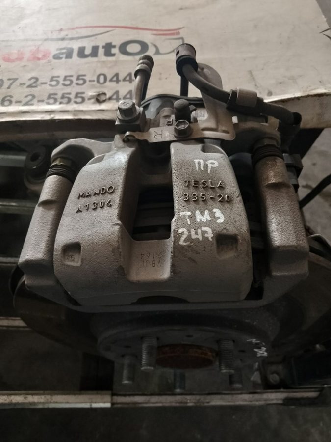 Супорт гальмівний задній правий 1044624-00-I TESLA MODEL 3